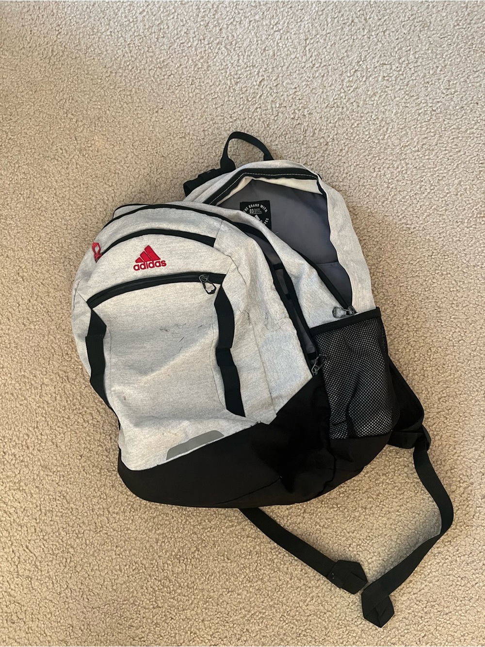 adidas Men’s Light Gray and Black Backpack with Red Logo